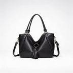Vera | Women’s Crossbody Bag With Tassel Accent And Bold Stitch Detailing | Modern